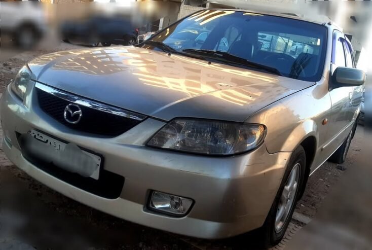 للبيع مازدا جوهرة 2002 خالية جوا مع سقف زنار واطي نضافة أتومتيك اساسي/ فرش جلد / جنط كروم  مكيف حامي بارد/ بلور كهربا