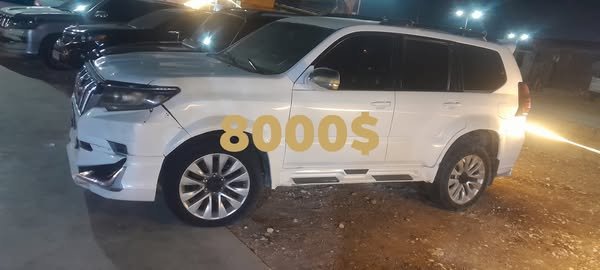 برادو ٢٠٠٢محدثه ٢٠١٨نضافه لون ابيض محرك علمحرمه بانزين 2