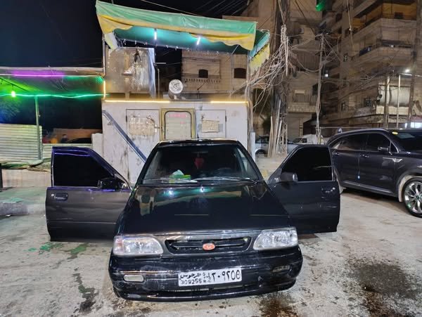 سابا أوتوماتيك 2009 بخاخ لون أسود خالي السقف و جوا موتور و دواليب و دوزان و كهربا كلو جديد