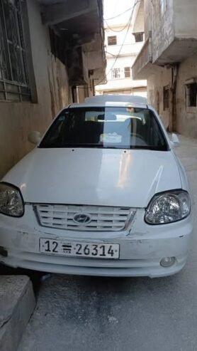 للبيع بدمشق هونداي اكسنت كوري صنع 2005 تسجيل 2006خالية جوا وسقف زنار واطي محرك 1400cc